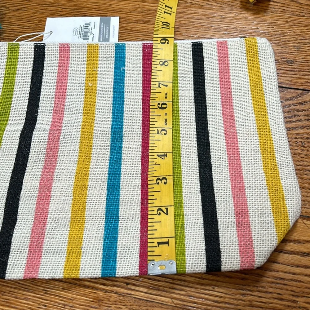 Mud Pie new with tag striped jute bag. Green, pink, black gold. Pompom tassles.